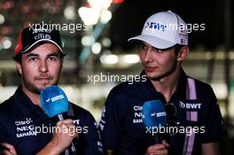 (L to R): Sergio Perez (MEX) Sahara Force India F1 with team mate Esteban Ocon (FRA) Sahara Force India F1 Team. 23.11.2017. Formula 1 World Championship, Rd 20, Abu Dhabi Grand Prix, Yas Marina Circuit, Abu Dhabi, Preparation Day.