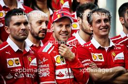 Sebastian Vettel (GER) Ferrari at a team photograph. 23.11.2017. Formula 1 World Championship, Rd 20, Abu Dhabi Grand Prix, Yas Marina Circuit, Abu Dhabi, Preparation Day.