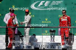 The podium (L to R): Sebastian Vettel (GER) Ferrari, second; Lewis Hamilton (GBR) Mercedes AMG F1, race winner; Kimi Raikkonen (FIN) Ferrari, third. 22.10.2017. Formula 1 World Championship, Rd 17, United States Grand Prix, Austin, Texas, USA, Race Day.