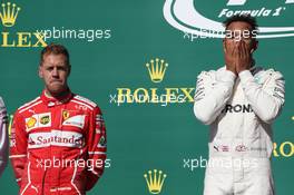 Sebastian Vettel (GER) Ferrari SF70H and Lewis Hamilton (GBR) Mercedes AMG F1 W08. 22.10.2017. Formula 1 World Championship, Rd 17, United States Grand Prix, Austin, Texas, USA, Race Day.
