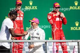 (L to R): Usain Bolt (JAM) Athlete on the podium with race winner Lewis Hamilton (GBR) Mercedes AMG F1. 22.10.2017. Formula 1 World Championship, Rd 17, United States Grand Prix, Austin, Texas, USA, Race Day.
