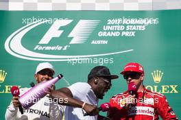 (L to R): Lewis Hamilton (GBR) Mercedes AMG F1 with Usain Bolt (JAM) Athlete and Kimi Raikkonen (FIN) Ferrari on the podium. 22.10.2017. Formula 1 World Championship, Rd 17, United States Grand Prix, Austin, Texas, USA, Race Day.