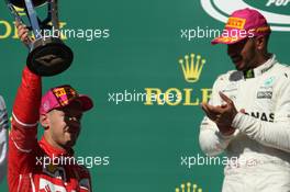 Sebastian Vettel (GER) Ferrari SF70H and Lewis Hamilton (GBR) Mercedes AMG F1. 22.10.2017. Formula 1 World Championship, Rd 17, United States Grand Prix, Austin, Texas, USA, Race Day.