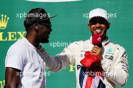The podium (L to R): Usain Bolt (JAM) Athlete and race winner Lewis Hamilton (GBR) Mercedes AMG F1. 22.10.2017. Formula 1 World Championship, Rd 17, United States Grand Prix, Austin, Texas, USA, Race Day.