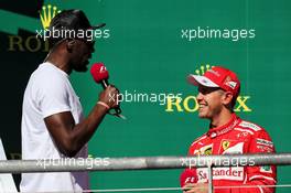 The podium (L to R): Usain Bolt (JAM) Athlete and second placed Sebastian Vettel (GER) Ferrari. 22.10.2017. Formula 1 World Championship, Rd 17, United States Grand Prix, Austin, Texas, USA, Race Day.