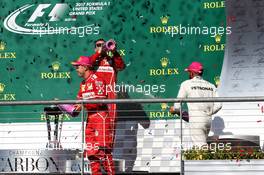 Sebastian Vettel (GER) Ferrari, Kimi Raikkonen (FIN) Ferrari and Lewis Hamilton (GBR) Mercedes AMG F1, celebrate on the podium. 22.10.2017. Formula 1 World Championship, Rd 17, United States Grand Prix, Austin, Texas, USA, Race Day.
