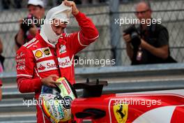 Sebastian Vettel (GER) Ferrari SF70H in qualifying parc ferme. 21.10.2017. Formula 1 World Championship, Rd 17, United States Grand Prix, Austin, Texas, USA, Qualifying Day.