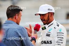 (L to R): Will Buxton (GBR) NBC Sports Network TV Presenter with Lewis Hamilton (GBR) Mercedes AMG F1 in qualifying parc ferme. 21.10.2017. Formula 1 World Championship, Rd 17, United States Grand Prix, Austin, Texas, USA, Qualifying Day.