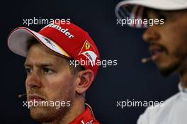 (L to R): Sebastian Vettel (GER) Ferrari and Lewis Hamilton (GBR) Mercedes AMG F1 in the FIA Press Conference. 21.10.2017. Formula 1 World Championship, Rd 17, United States Grand Prix, Austin, Texas, USA, Qualifying Day.