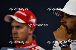 Lewis Hamilton (GBR) Mercedes AMG F1 (Right) and Sebastian Vettel (GER) Ferrari in the FIA Press Conference. 21.10.2017. Formula 1 World Championship, Rd 17, United States Grand Prix, Austin, Texas, USA, Qualifying Day.