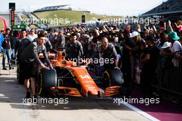McLaren MCL32 passes Nicolas Hamilton (GBR). 19.10.2017. Formula 1 World Championship, Rd 17, United States Grand Prix, Austin, Texas, USA, Preparation Day.