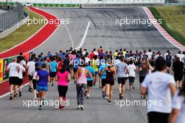 Members of the paddock run the track in support of Drive for The Cure. 19.10.2017. Formula 1 World Championship, Rd 17, United States Grand Prix, Austin, Texas, USA, Preparation Day.