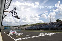 Race winner Marco Wittmann (GER) BMW Team RMG, BMW M4 DTM takes the chequered flag at the end of the race. 03.06.2018, DTM Round 3, Hungaroring, Hungary, Sunday.