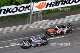 Bruno Spengler (CDN) (BMW Team RBM - BMW M4 DTM) und Edoardo Mortara (ITA) (HWA AG - Mercedes-AMG C 63 DTM)    24.06.2018, DTM Round 4, Norisring, Germany, Sunday.