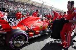 Sebastian Vettel (GER) Ferrari SF71H on the grid. 25.03.2018. Formula 1 World Championship, Rd 1, Australian Grand Prix, Albert Park, Melbourne, Australia, Race Day.