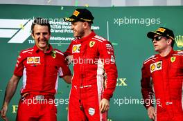 Race winner Sebastian Vettel (GER) Ferrari (Centre) celebrates with Inaki Rueda, Ferrari Race Strategist (Left) and team mate Kimi Raikkonen (FIN) Ferrari (Right). 25.03.2018. Formula 1 World Championship, Rd 1, Australian Grand Prix, Albert Park, Melbourne, Australia, Race Day.