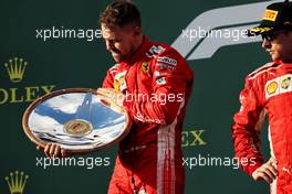 Race winner Sebastian Vettel (GER) Ferrari celebrates on the podium. 25.03.2018. Formula 1 World Championship, Rd 1, Australian Grand Prix, Albert Park, Melbourne, Australia, Race Day.