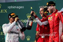 (L to R): Lewis Hamilton (GBR) Mercedes AMG F1 celebrates his second position with race winner Sebastian Vettel (GER) Ferrari. 25.03.2018. Formula 1 World Championship, Rd 1, Australian Grand Prix, Albert Park, Melbourne, Australia, Race Day.