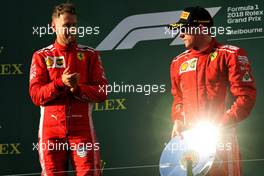 (L to R): Race winner Sebastian Vettel (GER) Ferrari celebrates with third placed Kimi Raikkonen (FIN) Ferrari. 25.03.2018. Formula 1 World Championship, Rd 1, Australian Grand Prix, Albert Park, Melbourne, Australia, Race Day.