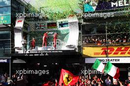 The podium (L to R): Lewis Hamilton (GBR) Mercedes AMG F1, second; Sebastian Vettel (GER) Ferrari, race winner; Kimi Raikkonen (FIN) Ferrari, third. 25.03.2018. Formula 1 World Championship, Rd 1, Australian Grand Prix, Albert Park, Melbourne, Australia, Race Day.