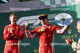 Kimi Raikkonen (FIN) Ferrari celebrates his third position on the podium. 25.03.2018. Formula 1 World Championship, Rd 1, Australian Grand Prix, Albert Park, Melbourne, Australia, Race Day.