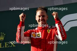 Race winner Sebastian Vettel (GER) Ferrari celebrates on the podium. 25.03.2018. Formula 1 World Championship, Rd 1, Australian Grand Prix, Albert Park, Melbourne, Australia, Race Day.