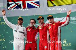 The podium (L to R): Lewis Hamilton (GBR) Mercedes AMG F1, second; Inaki Rueda (ESP) Ferrari Race Strategist; Sebastian Vettel (GER) Ferrari, race winner; Kimi Raikkonen (FIN) Ferrari, third. 25.03.2018. Formula 1 World Championship, Rd 1, Australian Grand Prix, Albert Park, Melbourne, Australia, Race Day.