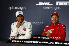 (L to R): Lewis Hamilton (GBR) Mercedes AMG F1 with race winner Sebastian Vettel (GER) Ferrari in the FIA Press Conference. 25.03.2018. Formula 1 World Championship, Rd 1, Australian Grand Prix, Albert Park, Melbourne, Australia, Race Day.