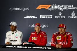 The post race FIA Press Conference (L to R): Lewis Hamilton (GBR) Mercedes AMG F1, second; Sebastian Vettel (GER) Ferrari, race winner; Kimi Raikkonen (FIN) Ferrari, third. 25.03.2018. Formula 1 World Championship, Rd 1, Australian Grand Prix, Albert Park, Melbourne, Australia, Race Day.