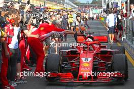 Maurizio Arrivabene (ITA) Scuderia Ferrari Team Principal and Sebastian Vettel (GER) Scuderia Ferrari  25.03.2018. Formula 1 World Championship, Rd 1, Australian Grand Prix, Albert Park, Melbourne, Australia, Race Day.
