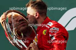 Race winner Sebastian Vettel (GER) Ferrari celebrates on the podium. 25.03.2018. Formula 1 World Championship, Rd 1, Australian Grand Prix, Albert Park, Melbourne, Australia, Race Day.