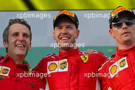 Sebastian Vettel (GER) Scuderia Ferrari and Kimi Raikkonen (FIN) Scuderia Ferrari  25.03.2018. Formula 1 World Championship, Rd 1, Australian Grand Prix, Albert Park, Melbourne, Australia, Race Day.