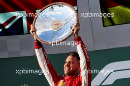 Race winner Sebastian Vettel (GER) Ferrari celebrates on the podium. 25.03.2018. Formula 1 World Championship, Rd 1, Australian Grand Prix, Albert Park, Melbourne, Australia, Race Day.