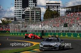 Sebastian Vettel (GER) Ferrari SF71H leads behind the FIA Safety Car. 25.03.2018. Formula 1 World Championship, Rd 1, Australian Grand Prix, Albert Park, Melbourne, Australia, Race Day.