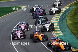 Fernando Alonso (ESP) McLaren MCL33 and Stoffel Vandoorne (BEL) McLaren MCL33 at the start of the race. 25.03.2018. Formula 1 World Championship, Rd 1, Australian Grand Prix, Albert Park, Melbourne, Australia, Race Day.