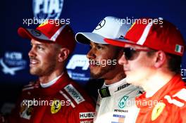 Qualifying top three in parc ferme (L to R): Sebastian Vettel (GER) Ferrari, third; Lewis Hamilton (GBR) Mercedes AMG F1, pole position; Kimi Raikkonen (FIN) Ferrari, second. 24.03.2018. Formula 1 World Championship, Rd 1, Australian Grand Prix, Albert Park, Melbourne, Australia, Qualifying Day.