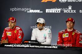 The post qualifying FIA Press Conference (L to R): Sebastian Vettel (GER) Ferrari, third; Lewis Hamilton (GBR) Mercedes AMG F1, pole position; Kimi Raikkonen (FIN) Ferrari, second. 24.03.2018. Formula 1 World Championship, Rd 1, Australian Grand Prix, Albert Park, Melbourne, Australia, Qualifying Day.