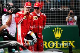 (L to R): Sebastian Vettel (GER) Ferrari and team mate Kimi Raikkonen (FIN) Ferrari look at the Mercedes AMG F1 W09 of Lewis Hamilton (GBR) Mercedes AMG F1 in qualifying parc ferme. 24.03.2018. Formula 1 World Championship, Rd 1, Australian Grand Prix, Albert Park, Melbourne, Australia, Qualifying Day.
