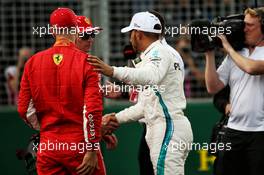 Pole sitter Lewis Hamilton (GBR) Mercedes AMG F1 with Sebastian Vettel (GER) Ferrari and Kimi Raikkonen (FIN) Ferrari in qualifying parc ferme. 24.03.2018. Formula 1 World Championship, Rd 1, Australian Grand Prix, Albert Park, Melbourne, Australia, Qualifying Day.