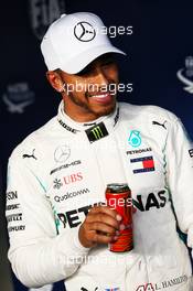 Lewis Hamilton (GBR) Mercedes AMG F1 celebrates his pole position in qualifying parc ferme. 24.03.2018. Formula 1 World Championship, Rd 1, Australian Grand Prix, Albert Park, Melbourne, Australia, Qualifying Day.