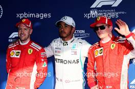 Qualifying top three in parc ferme (L to R): Sebastian Vettel (GER) Ferrari, third; Lewis Hamilton (GBR) Mercedes AMG F1, pole position; Kimi Raikkonen (FIN) Ferrari, second. 24.03.2018. Formula 1 World Championship, Rd 1, Australian Grand Prix, Albert Park, Melbourne, Australia, Qualifying Day.