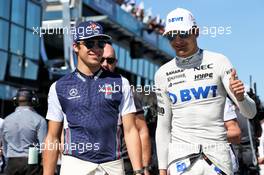 (L to R): Lance Stroll (CDN) Williams with Esteban Ocon (FRA) Sahara Force India F1 Team on the drivers parade. 25.03.2018. Formula 1 World Championship, Rd 1, Australian Grand Prix, Albert Park, Melbourne, Australia, Race Day.