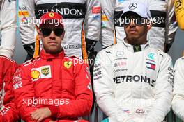 Sebastian Vettel (GER) Scuderia Ferrari and Lewis Hamilton (GBR) Mercedes AMG F1   25.03.2018. Formula 1 World Championship, Rd 1, Australian Grand Prix, Albert Park, Melbourne, Australia, Race Day.