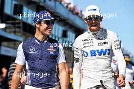 (L to R): Lance Stroll (CDN) Williams with Esteban Ocon (FRA) Sahara Force India F1 Team on the drivers parade. 25.03.2018. Formula 1 World Championship, Rd 1, Australian Grand Prix, Albert Park, Melbourne, Australia, Race Day.
