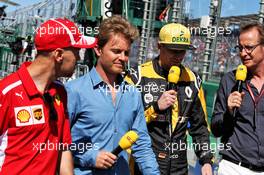 (L to R): Sebastian Vettel (GER) Ferrari with Nico Rosberg (GER) and Nico Hulkenberg (GER) Renault Sport F1 Team. 25.03.2018. Formula 1 World Championship, Rd 1, Australian Grand Prix, Albert Park, Melbourne, Australia, Race Day.