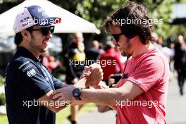 (L to R): Sergio Perez (MEX) Sahara Force India F1 with Fernando Alonso (ESP) McLaren. 22.03.2018. Formula 1 World Championship, Rd 1, Australian Grand Prix, Albert Park, Melbourne, Australia, Preparation Day.