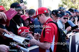 Kimi Raikkonen (FIN) Ferrari signs autographs for the fans. 22.03.2018. Formula 1 World Championship, Rd 1, Australian Grand Prix, Albert Park, Melbourne, Australia, Preparation Day.