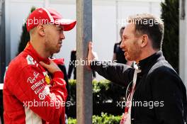(L to R): Sebastian Vettel (GER) Ferrari with Christian Horner (GBR) Red Bull Racing Team Principal. 22.03.2018. Formula 1 World Championship, Rd 1, Australian Grand Prix, Albert Park, Melbourne, Australia, Preparation Day.