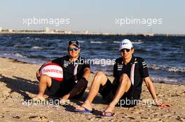 (L to R): Sergio Perez (MEX) Sahara Force India F1 with Esteban Ocon (FRA) Sahara Force India F1 Team - Havaianas. 22.03.2018. Formula 1 World Championship, Rd 1, Australian Grand Prix, Albert Park, Melbourne, Australia, Preparation Day.