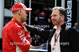 (L to R): Sebastian Vettel (GER) Ferrari with Christian Horner (GBR) Red Bull Racing Team Principal. 22.03.2018. Formula 1 World Championship, Rd 1, Australian Grand Prix, Albert Park, Melbourne, Australia, Preparation Day.